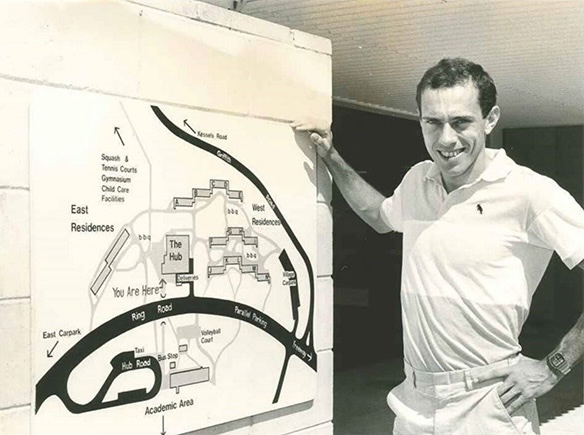 British track athlete Steve Ovett viewing a map of the Commonwealth Games Village at Nathan 1982
